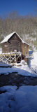 House in a Snow Covered Landscape, Glade Creek, Grist Mill Babcock State Park, West Virginia, USA