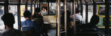 Group of People Traveling in a Tram, Hong Kong, China