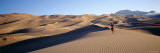 Buy Woman Running in the Desert, Great Sand Dunes National Monument, Colorado, USA at AllPosters.com