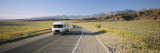Buy Land Vehicles on a Desert Road, Death Valley National Park, California, USA at AllPosters.com