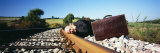 Mature Man Listening and Putting His Head on a Railroad Track, Germany