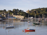 Buy View Across River Estuary to Town Wall Quay and Harbour with Moored Boats on Calm Water, Wales at AllPosters.com