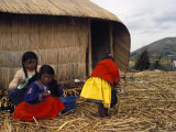 Small Group of Women and Girls of the Uros People on the Floating Reed Islands, Lake Titicaca, Peru