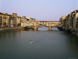 Skiff on the River Arno and the Ponte Vecchio, Florence, Tuscany, Italy
