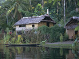 Buy Houses and Boat, Sepik River, Papua New Guinea at AllPosters.com