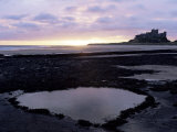 Bamburgh Castle at Sunrise, Bamburgh, Northumberland, England, United Kingdom