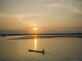 Buy Sunset Over Araguava River, Bananal and Karaja Indian in Canoe, Brazil, South America at AllPosters.com