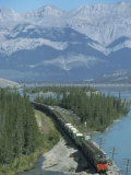 Buy Canadian National Railways Goods Train Along Athabasca River, Jasper National Park, Rocky Mountains at AllPosters.com
