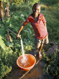 Buy Boy at Water Tap, Chuka Village, Mount Kenya, Kenya, East Africa, Africa at AllPosters.com