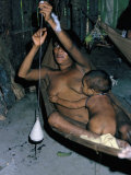 Buy Amazonian Indian Woman Spinning, Brazil, South America at AllPosters.com