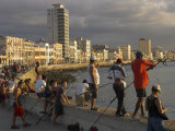 Men Fishing at Sunset, Avenue Maceo, El Malecon, Havana, Cuba, West Indies, Central America