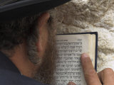 An Orthodox Jew Holding Prayer Book Against the Wall and Praying, Western Wall, Jerusalem, Israel