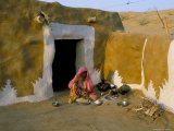 Buy Woman Cooking Outside House with Painted Walls, Village Near Jaisalmer, Rajasthan State, India at AllPosters.com