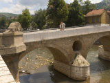Buy Couple on the Latin Bridge, Across the River Miljacka, Sarajevo, Bosnia, Bosnia-Herzegovina at AllPosters.com