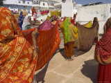 Buy Group of Women Drying Their Saris by the Sacred Lake, Pushkar, Rajasthan State, India at AllPosters.com