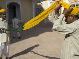 Guard Winding His Yellow and Green Turban, Moti Mahal Courtyard, Meherangarh Fort, Jodhpur, India