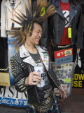 Buy Boy with Spiky Hair and Tartan Kilt, Drinking Beer, Tokyo, Japan at AllPosters.com
