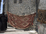 Local Woman Walking Down Steps, Blanket on Wall, Aleppo (Haleb), Syria, Middle East