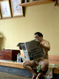 Buy Sumo Wrestler Reading Newspaper, Tokyo City, Honshu Island, Japan at AllPosters.com