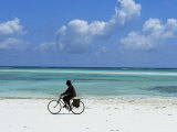 Buy A Man Riding His Bicycle of Kiwengwa Beach, Island of Zanzibar, Tanzania, East Africa, Africa at AllPosters.com