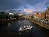 Excursion Boat on Canal in the Speicherstadt, the Historical Warehouse City Area, Hamburg, Germany