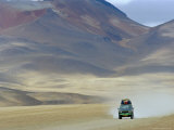 Buy 4 Wheel Drive Car Driving Through a Colourful Volcanic Landscape Near Las Rocas De Dali at AllPosters.com