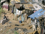 Untouchables (Harijan) in Shanty Hovels Alongside River in Town Centre, Coonor, Tamil Nadu, India