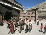 Buy Pilgrims in Monastery Courtyard, Sakya, Tibet, China at AllPosters.com