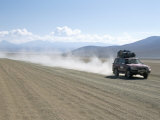 Buy Land Cruiser on Altiplano Track and Tourists Going to Laguna Colorado, Southwest Highlands, Bolivia at AllPosters.com