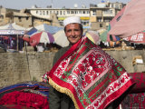 Man Selling Rugs on Banks of Kabul River, Central Kabul, Afghanistan