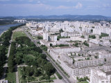 Blocks of Flats Beside Taedong River, Park and Distant Mayday Stadium, Pyongyang, North Korea