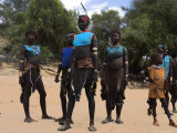 Women Sing and Dance Before the Bull Jumping, Turmi, Ethiopia