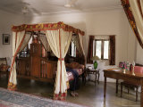 Reproduction Colonial Style Four Poster Bed and Block Printed Fabrics in Guest Bedroom