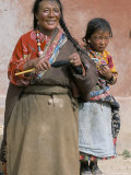 Buy Tibetan Woman Spinning, Qinghai Province, China at AllPosters.com