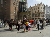 Buy Horse and Carriages in Main Market Square, Old Town District, Krakow, Poland at AllPosters.com