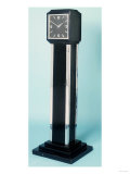 An Art Deco Ebonised Cocktail Cabinet, in the Form of a Long Case Clock