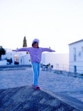 Buy Girl Balancing on Edge, Caceres, Extremadura, Spain at AllPosters.com