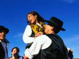 Man Lifting Up His Daughter at Festa de Santo Antonio, Lisbon, Portugal