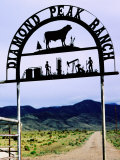 Wrought-Iron Ranch Sign at Gate with Sacramento Mountains in Background, New Mexico