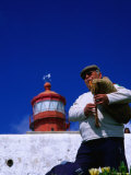 Lone Bagpiper Plays Beneath the Cabo Da Roca Lighthouse, Sintra, Estremadura, Portugal