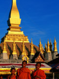Buy Three Young Monks Standing in Front of Pha That Luang, Vientiane, Vientiane Prefecture, Laos at AllPosters.com