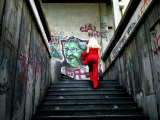 Buy Woman Climbing Graffiti Stairwell, Belgrade, Serbia at AllPosters.com