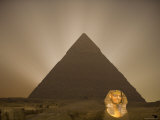 Cheops Pyramid and King Tut Image Superimposed on Sphinx at Night, Cairo