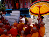 Buy Buddhist Monks at Wat Xiengthong, Lunar New Year, Luang Prabang, Laos at AllPosters.com