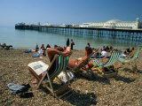 Buy Sunbathers on Deckchairs Near Brighton Pier, Brighton, Brighton and Hove, England at AllPosters.com