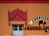 Pig and Pink Curtain Facade in Dzitbalche, Campeche, Mexico