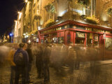 Buy People Walking Past the Temple Bar at Night, Dublin at AllPosters.com