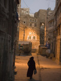 Woman Walking in Old Town, Dusk, San'a, Yemen