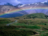 Buy Rainbow over Road Leading to Snow-Capped Mountains, Arthur's Pass National Park, New Zealand at AllPosters.com