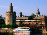 Boat on River in Front of Torre del Oro, Sevilla, Andalucia, Spain